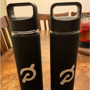 Pair of peloton glass water bottles